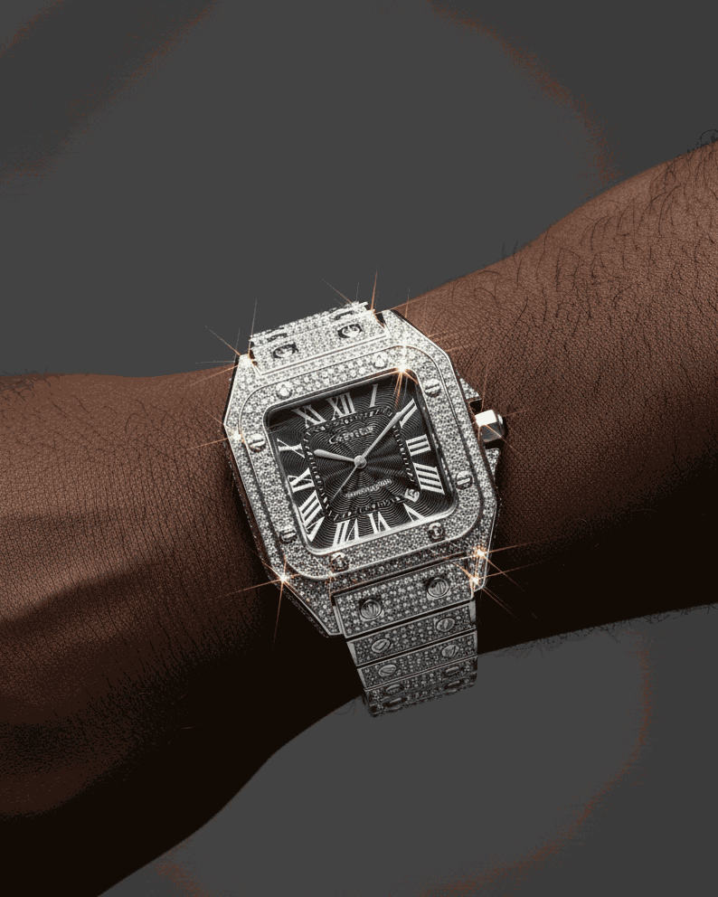 Luxury diamond-encrusted watch on a wrist against a dark background