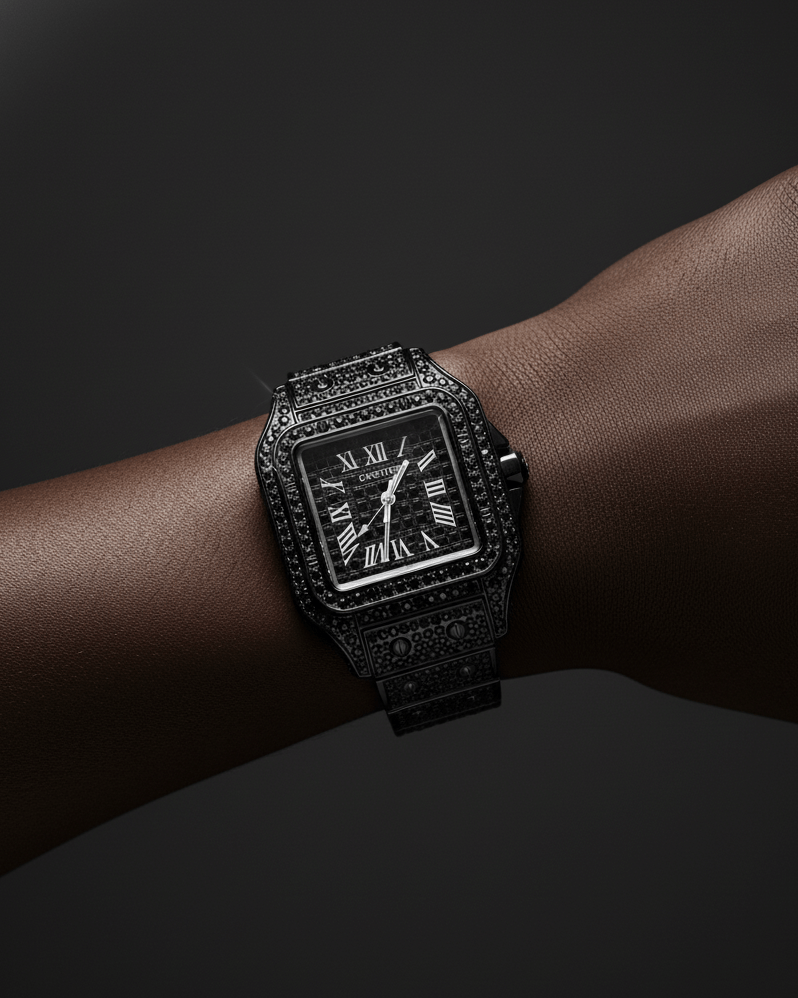 Luxury black watch with diamond accents on a wrist against a dark background