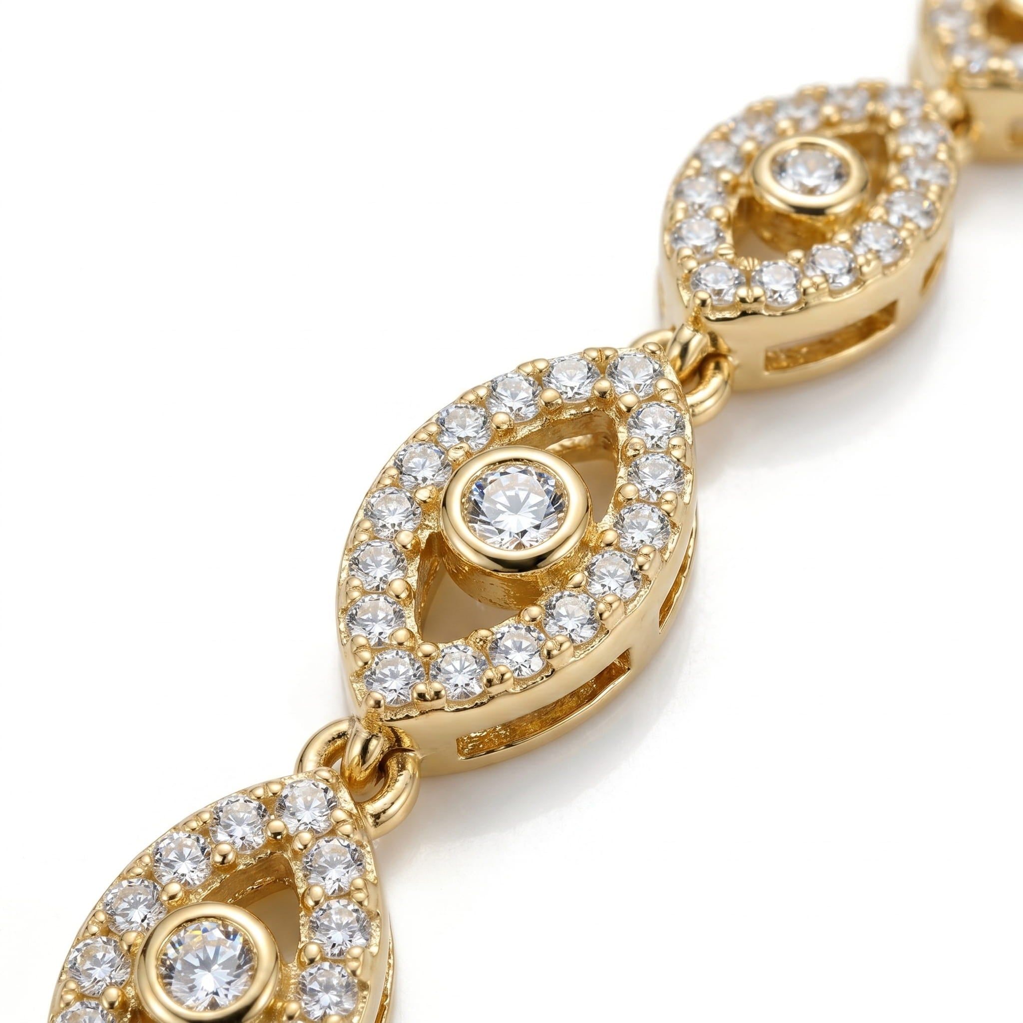 Gold bracelet with diamond accents on a white background