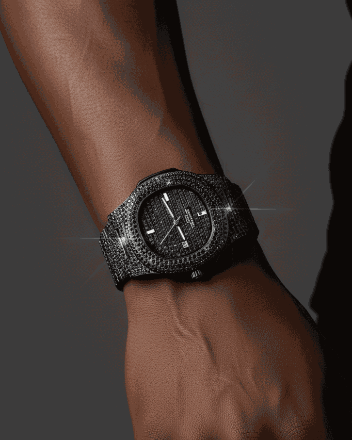 Luxury watch with diamond-studded band on a wrist against a dark background