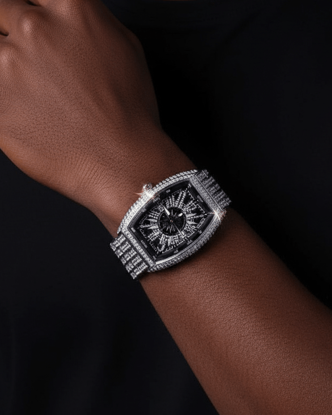 Man wearing a luxurious watch on a dark background