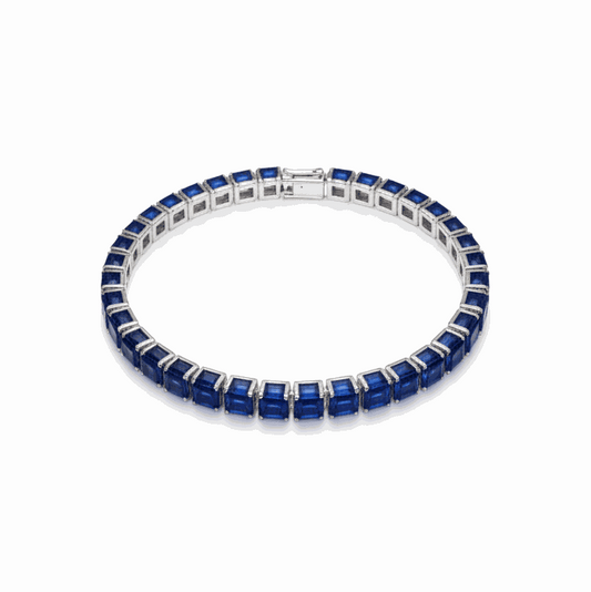 Bracelet with blue beads on a white background
